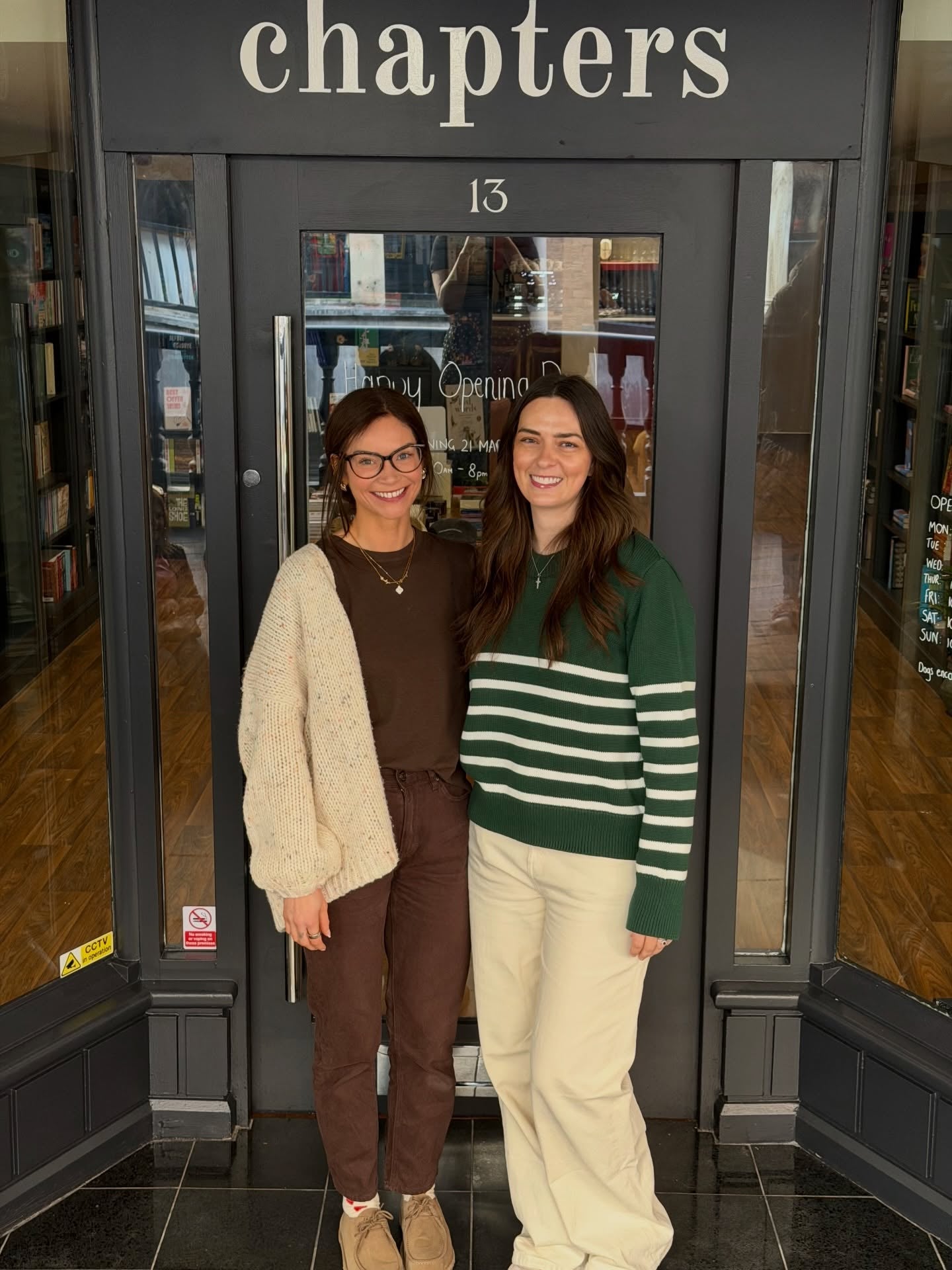 Megan and Megan smiling outside the Chapters shop front on opening day